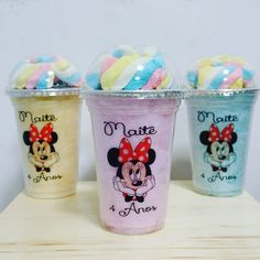 three cups with mickey mouse and minnie mouse ice cream