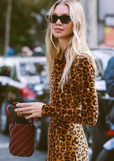 leopard print dress, Rabanne The Pacoïo two-way handbag burgundy bag with metal rings, black sunglasses #parisfashionweek2023 #parisfashionweek #parisfashionweekstreetstyle #streetstyle #fashionweek #2023fashiontrends #2024fashiontrends #falloutfits #fallstreetstyle Ss 2024, Burgundy Bag, Paris Fashion Week Street Style, The Best Street Style, Leopard Dress, Paris Street Style, Paris Photos, Spring Street Style, Best Street Style