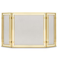 a gold fireplace screen with mesh panels on the top and bottom, in front of a white background