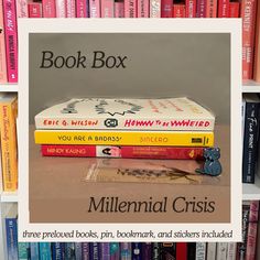 books are stacked on top of each other in front of a book shelf filled with books