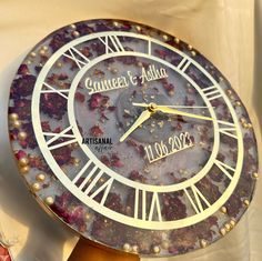 a decorative clock with the date on it