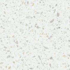 a white counter top with grey speckles on it