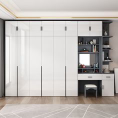 an empty room with white cabinets and drawers