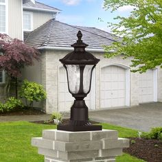 a lamp post in front of a house