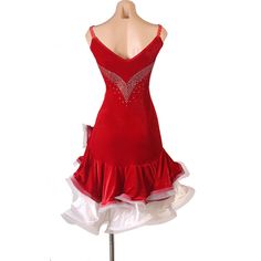 a red dress with white ruffles on it