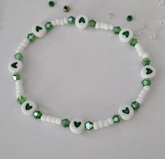 St. Patrick's Day beaded bracelet with Charms and Letter Beads, St. Patrick's Day, Stretch Bracelet This bracelet is made with custom sizing.  You choose from 6 to 8 inches. if you need a smaller or larger size please message me the details. Listing includes ONE bracelet. Any images shown with multiple bracelets is to be used as an example of how they can be stacked with other Bracelets. ALL ORDERS ARE FINAL SALE. THESE ARE CUSTOM BRACELETS MADE TO ORDER. PLEASE DOUBLE CHECK SIZE SELECTIONS PRIOR TO CHECKOUT.  CARING TIPS:  - Do not expose jewelry to water - Treat and store jewelry gently - Roll bracelets on rather than stretching band to get on. The beads used for this bracelet are small (8/0 Glass Seed Beads) and should not be used for children under 4 years old.  Please don't let the ch Beaded Bracelet With Letters, Concert Bead Bracelets, Double Beaded Bracelet Diy, Basic Beaded Bracelet, Cute Small Bead Bracelet Ideas, Bracelet Small Beads, Small Beads Ideas, St Patricks Day Bracelet, Mini Bead Bracelet Ideas