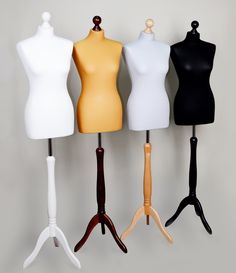 three mannequins are standing next to each other in different colors and sizes