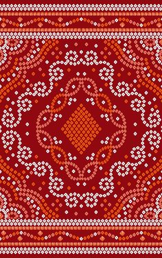 a red and white pattern with an ornate design on it's side, in the middle