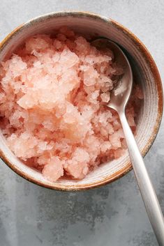 a bowl filled with sugar and a spoon