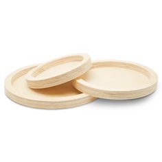 three wooden plates sitting on top of each other