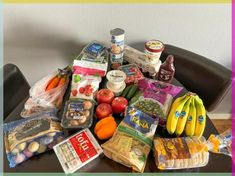 an assortment of food sitting on top of a table