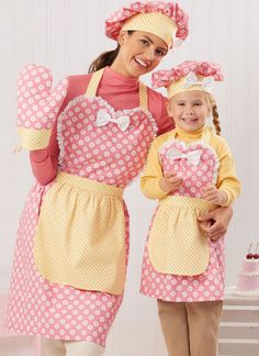 Aprons with sweetheart bibs have full skirts with contrast overskirt for a double-apron look and contrast neck ties, waistbands and back ties. Trim variations include lace edging, tailored bow, rick... Kids Apron Pattern Free, Maternity Shirt Dress, Child Apron, Interfacing Sewing, Cape Costume, Hat Patterns To Sew, Tilly And The Buttons, Sewing Aprons, Full Skirts