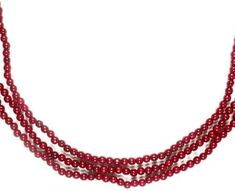 three strands of red beads on a white background