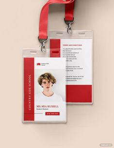 a red and white id card with a lanyard hanging from it's side