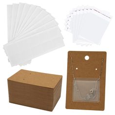 PRICES MAY VARY. WHAT YOU GET - 100 pcs necklace chain pouches (10 pcs per sheet, 10 sheets per pack), 100 pcs necklace display cards, 100 pcs self-sealing bags. SIZE - Each pouch measures 3.8 x 4.3 cm/1.5 x 1.7 in; Each display card measures 6 x 9 cm/2.4 x 3.5 in. USAGE - Peel the chain pocket off and stick it on the back of the display cards to hold the loose chain. HIGH QUALITY - Our necklace chain pockets are made of high quality plastic material, easy to operate and not easy to tear. NOTES Chain Storage, Keychain Display, Jewelry Display Cards, Earring Card, Back Bag, Necklace Display, Earring Holder, Packaging Supplies, Craft Bags