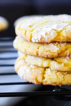 a stack of cookies sitting on top of a cooling rack