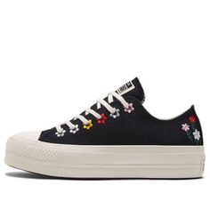 The Converse Chuck Taylor All Star Lift Platform Low 'Floral Embroidery' is a stylish and timeless sneaker that is perfect for any occasion. Inspired by the classic Chuck Taylor All Star series, which was born in 1917, this sneaker is a great way to express yourself and stand out from the crowd. The black upper features a unique floral embroidery pattern and a rubber sole for a comfortable fit. Whether you're running errands, going out with friends, or just taking a walk, this sneaker is the perfect choice to show off your individual style. (SNKR/Women's/Low Top/Thick Sole) Chuck Taylor All Star Lift, Taking A Walk, Floral Embroidery Patterns, Converse Chuck Taylor All Star, Chuck Taylor All Star, Embroidery Pattern, Converse Chuck, Chuck Taylor, Individual Style