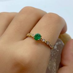 EMERALD GEM RING - Dainty Emerald Ring - Gemstone Wedding Ring Vintage - Yellow Gold Jewelry - Natural Emerald Ring - Wedding Ring Gift *100% naturel gemstone *14k solid gold *solid gold (NOT plated) *gemstone: emerald *gemstone: zircon *stone shape emerald: oval *stone shape zircon: round *stone emerald : 3x5 mm. *stone emerald ct. : 0.60-0.85 ct. *stones emerald : 1 pc. *stone zircon : 6 pcs. Wedding Emerald Ring With Diamond Accent Stones, Moissanite Emerald Ring For Wedding, Heirloom Emerald Ring With Bezel Setting For Wedding, Elegant Green Wedding Ring With Bezel Setting, Cubic Zirconia Emerald Ring With Accent Stones For Wedding, Diamond Ring For Wedding, May Birthstone, Wedding Emerald Ring With Cubic Zirconia Accent Stones, Exquisite Cubic Zirconia Emerald Ring For Wedding, Emerald Bezel Setting Ring For Wedding