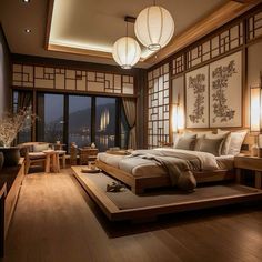 a bedroom with wood flooring and large windows