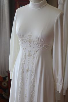 Vintage antique 1970s 1960s gown! I love this dress! Size 4/6 message me for more info its fabulous Boho hippie high fashion wedding gown. More pictures on fb: https://www.facebook.com/media/set/?vanity=RetroVintageWeddings1920s1930s&set=a.3620727078023309 60s Wedding Dress Vintage, Bohemian Embellished Wedding Gown, Bohemian Wedding Gown Embellished, Vintage Floor-length Wedding Dress With Fitted Bodice, Wedding Vintage Dress With Fitted Bodice, Floor-length, Floor-length Vintage Wedding Dress With Fitted Bodice, Vintage Embellished Wedding Gown, Bohemian Long Sleeve Vintage Dress For Wedding, Bohemian Long Sleeve Vintage Wedding Dress