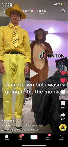 a man in yellow is standing next to another man wearing a monkey suit and tie