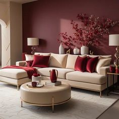 a living room filled with furniture and red pillows on top of it's walls