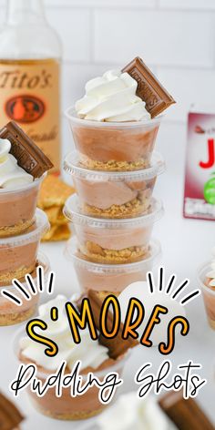 there are many desserts stacked on top of each other with the words, s'mores pudding shots