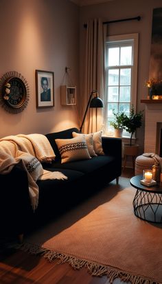 Black Couch Living Room Décor Bohemian Living Room Black Couch, Dark Sofas Living Room Decor Cozy, Black Couch Cozy Living Room, Gray And Black Couch Living Room Ideas, Black Sofa Room Decor, How To Style Black Sofa, Black Couch Decor Color Schemes, Mid Century Modern Living Room Black Couch, How To Style A Black Couch