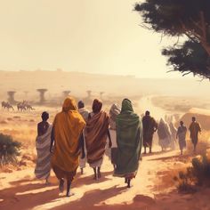 several people walking down a dirt road with camels in the background