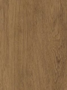 a close up view of the wood grains on an oak flooring paneled in light brown