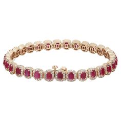 This stunning and exemplary bracelet is crafted in 14K yellow gold. Starring 31 radiant prong set emerald cut rubies, set with a halo of bright white round cut diamonds. Total diamond weight: 2.30 carats. Diamond quality: H-I and clarity SI. Total ruby weight: 8.10 carats. Bracelet length: 7 inches. Width: 6.7mm. Total weight: 18.50 grams. Super stackable and a perfect addition to your jewelry collection. Comes with a presentable gift box and appraisal. Bracelet Tennis, Diamond Tennis Bracelet, Royal Jewels, Tennis Bracelet Diamond, Ruby Diamond, Tennis Bracelet, Round Cut Diamond, Emerald Cut, Prong Setting