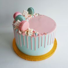 a cake with frosting and sprinkles on it