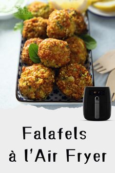 falafels on a plate with lemons in the background and text overlay