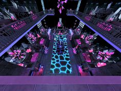 an image of a futuristic looking building with flowers on the floor and lights in the ceiling