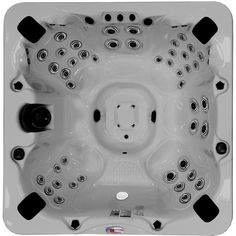 a white hot tub with black trimmings and round holes in the center,