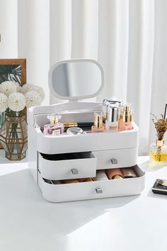 If you are looking for a makeup storage box that offers both organization and display options, then this large makeup organizer is perfect for you. Constructed from durable plastic, it provides reliable protection against dust and moisture, ensuring your beauty essentials stay in excellent condition. With three drawers and a top open compartment, you can efficiently organize and categorize your makeup collection without sacrificing the visibility of your belongings. It will be your best choice. Makeup Organizer With Mirror, Modern Makeup, Maternity Trousers, Makeup Storage Box, Brown Suits, Makeup Organizer, Big And Tall Outfits, Makeup Storage, Tie Shoes