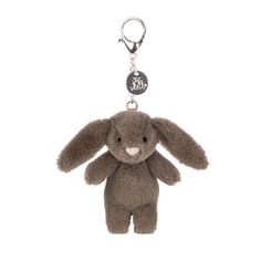 a brown stuffed animal keychain on a white background