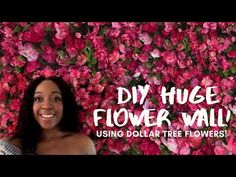 a woman standing in front of flowers with the words diy huge flower wall using dollar tree flowers