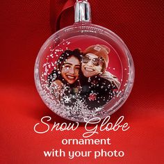 a christmas ornament with two people on it