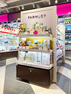 a store with many items on display in it's front window and the words farmacy above them