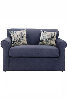 a blue couch with two pillows on it