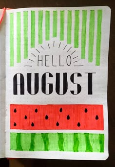 a notebook with the words hello august written in black and green ink on top of it