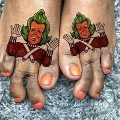 two people with tattoos on their feet and one has a green hair, the other is red