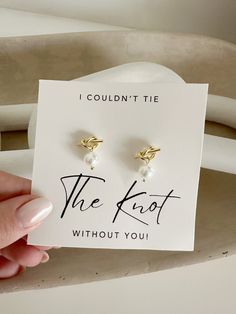 a pair of earrings that say i couldn't tie the knot without you