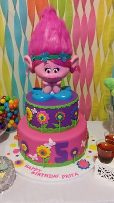 there is a birthday cake that looks like a troll