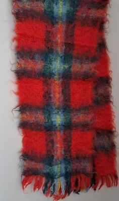 Here we have a Vintage, Craig-na-Creidhe, Tartan Mohair Scarf. It measures 23cm x 108 cm, excluding tassels. The scarf is 75% mohair,21% wool, and 4% nylon and was made in Scotland. Luxury Mohair Scarf For Winter, Luxury Mohair Scarves For Winter, Vintage Multicolor Winter Scarves, Mohair Plaid Scarf, Plaid Big Scarf Vintage, Mohair Scarf, Scarf Wrap, Tartan, Knitted Scarf