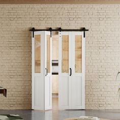 a living room with brick walls and white doors