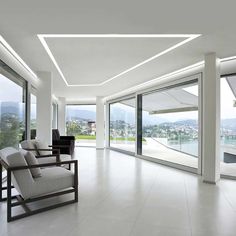 an empty living room with sliding glass doors