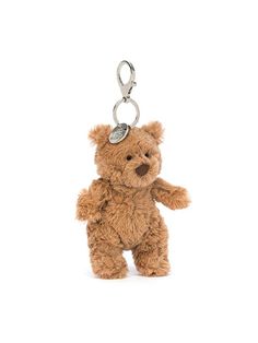 a brown teddy bear keychain on a white background