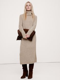 We cut this sweater dress from our luxuriously soft and warm signature cashmere, opting for a relaxed, column silhouette that evokes the season's nod to '90s minimalism.  Relaxed, column fit - Straight through the bust, waist and hips.  Good Cashmere Standard™: The cashmere for this product is produced according to the Good Cashmere Standard™, which aims to improve the welfare of the cashmere goats, protect natural resources, and support local farmers.  Turtleneck.  Pull-on design.  Straight hem.  Relaxed, column fit - Straight through the bust, waist and hips.  Long sleeves.  Midi length.  Model: Size S, 5'10" (178cm). 90s Minimalism, Burgundy Sweater Dress, Turtleneck Midi Dress, Fall Sweater Dress, Midi Sweater Dress, Dresses Casual Winter, Cashmere Dress, Turtleneck Dress, Long Sweater Dress